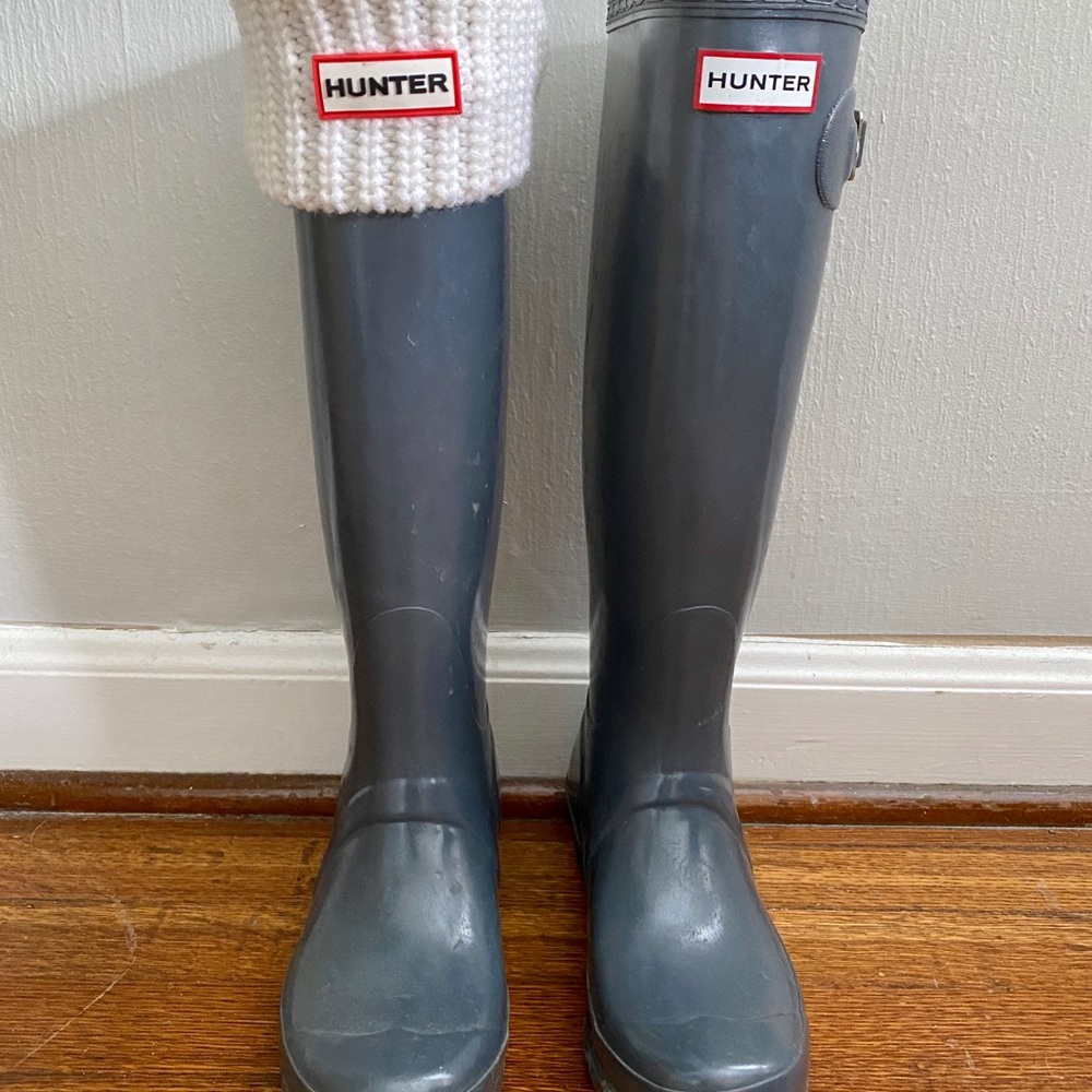 Tall gray Hunter boots with white knitted liners